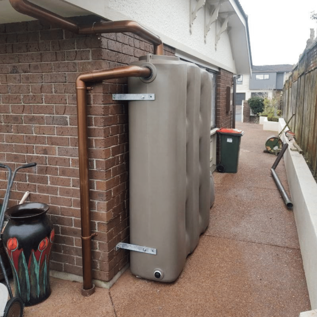 1000L Clay Brown StormPANEL system with copper piping installed by Just Tanks