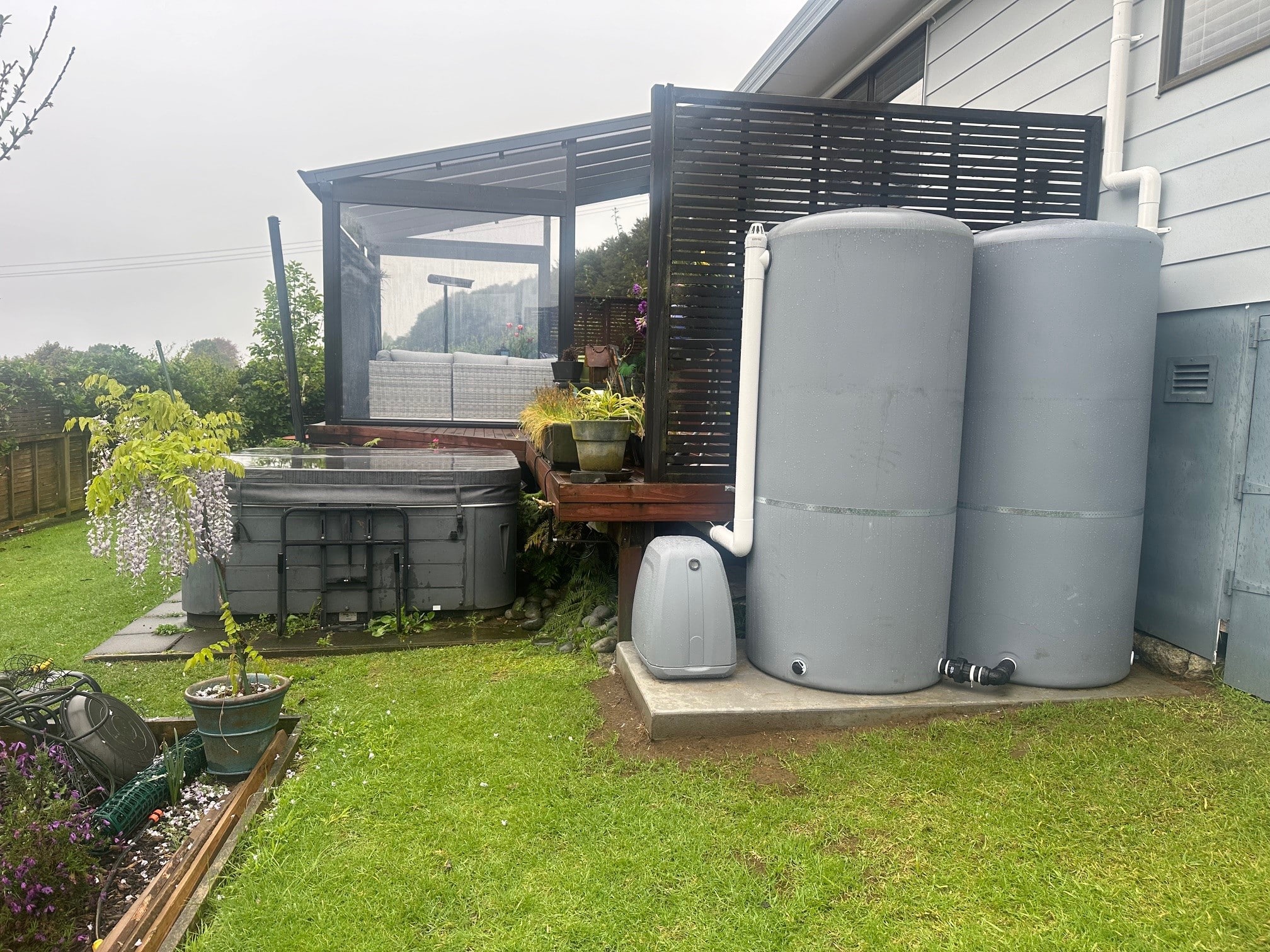2000L StormBANK water tank system with pump, installed by Just Tanks