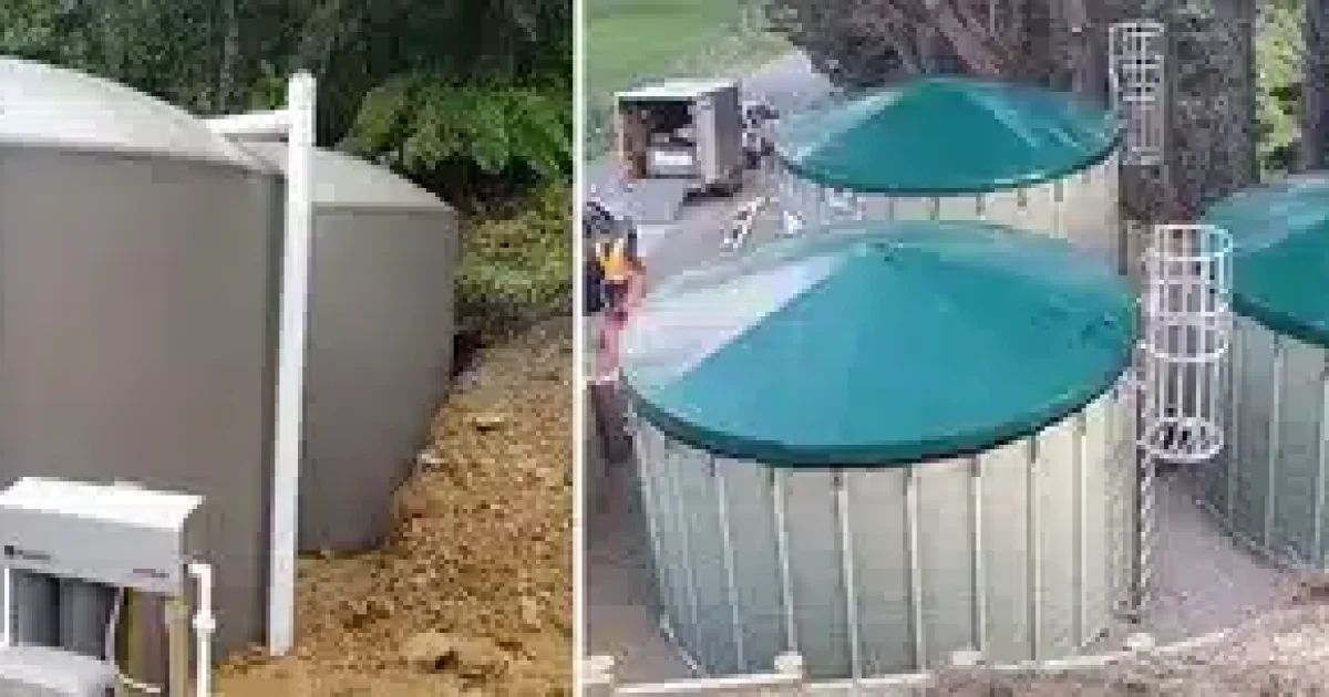 Rainwater tank NZ installed beside a New Zealand home for collecting roof water